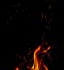 Fototapeta na wymiar Sparks in the Flame of Fire