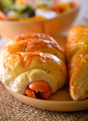 sausage bread on wooden background