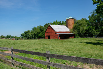 Barn and pasture with old wooden fence