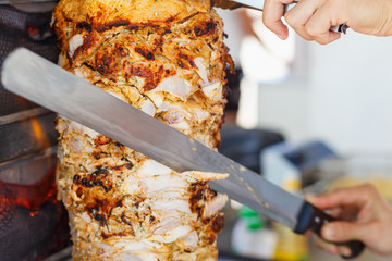 Shawarma meat being cut