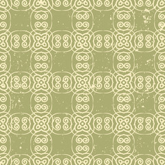 Ornamental grunge vintage textured green background. Scratched old seamless