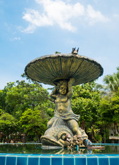 Fototapeta na wymiar Water Fountain in a Park