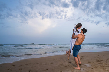 couple walking on the beach