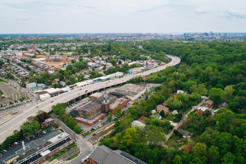 Fototapeta na wymiar View of the Jones Falls Expressway, Woodberry and Medfield, in Baltimore, Maryland.
