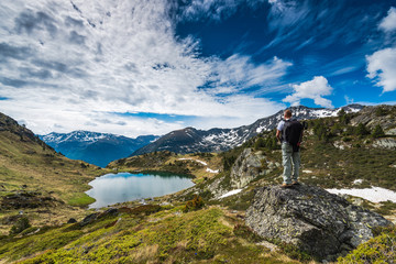 Active hiker with backpack in Pyrenees - obrazy, fototapety, plakaty