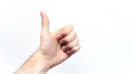Hand zeigt Daumen hoch