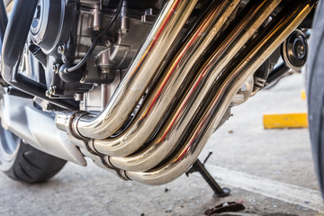 Close up of beautiful four exhaust motorcycle. Big motorbike