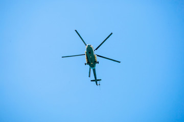 Passenger helicopter on sky.