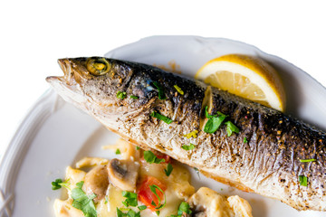 Baked fish mackerel with lemon