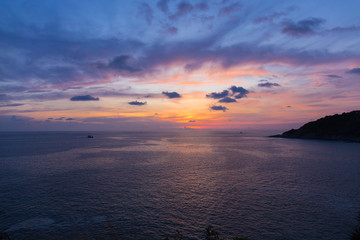 Colorful dramatic sky with cloud at sunset or twilight time.Sky with sun background at Promthep Cape Phuket Thailand