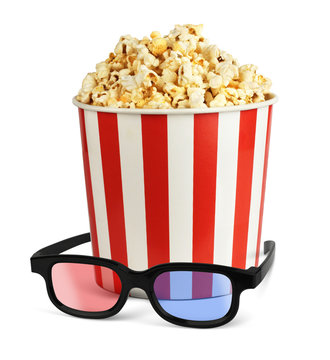 Popcorn in bucket with 3d glasses isolated on white