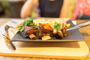Fried meat in a dish in a restaurant