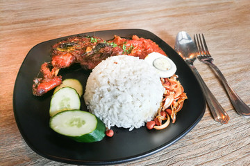 Nasi lemak with fried chicken, popular cuisine in Malaysia