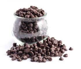 Pile of Dark chocolate chips isolated on white background.