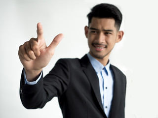 Businessman touching on a virtual screen