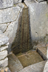 Fontaine inca au Machu Picchu au Pérou