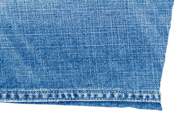Piece of light blue jeans fabric