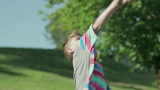 Boy throwing stones