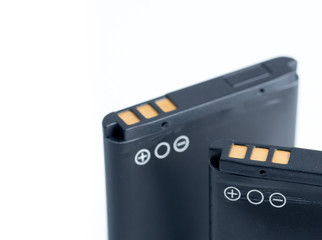 Obraz premium Smartphone battery on a white background. Lithium mobile phone accumulator.