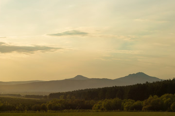 Naklejka na ściany i meble beautiful landscape with the Ural mountains at sunset