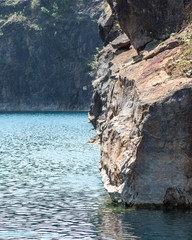 East wall of abandoned flooded quarry taken from base