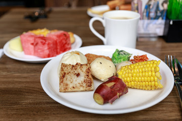 Dish of mixed breakfast - Bread, fruits