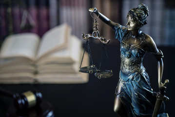 Lady Justice and law books in court - obrazy, fototapety, plakaty