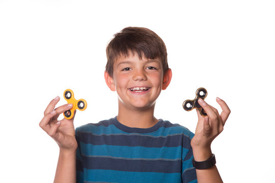 Boy with two Fidget Spinners