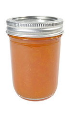 Homemade jar of apricot jam. Isolated.