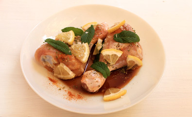Chicken legs soaked in soy sauce, lemon and spices