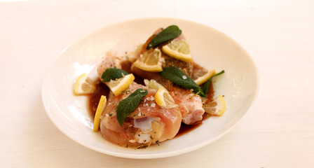 Chicken legs soaked in soy sauce, lemon and spices