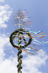 typical maypole in front of sky