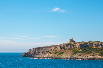 Fototapeta na wymiar Watchtower near ionian sea (Uluzzo tower in Porto Selvaggio) Apulia, Salento, Italy