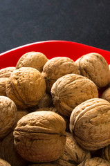 walnuts in red plate