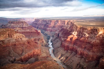 Fotobehang Arizona uitzicht over de zuid- en noordrand in de Grand Canyon vanuit de helikopter