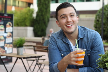 Man enjoying a nice drink outside 