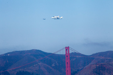 Space shuttle piggyback over Golden Gate Bridge