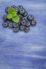 Fresh blueberries and mint leaf