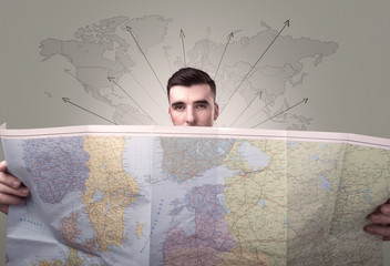 Young man holding map