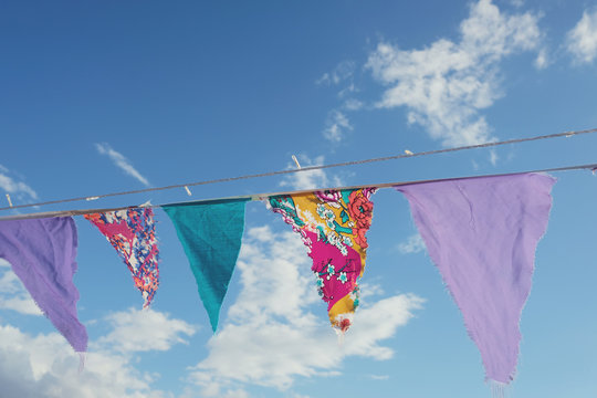 Summer Festive Colorful Bunting And Blue Sky