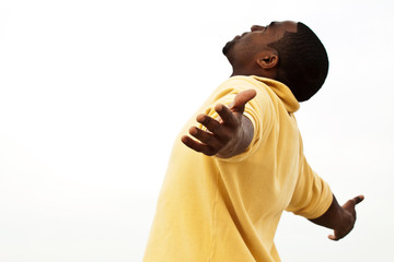 African American man with open arms.