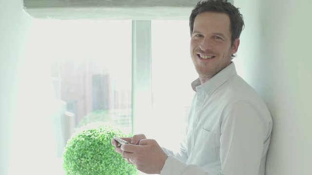 Man using smart phone