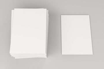 Stack of blank white closed brochure mock-up on white background