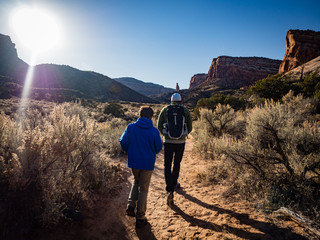 Father and son hiking in the Colorado National Monument © Jennifer Jean
