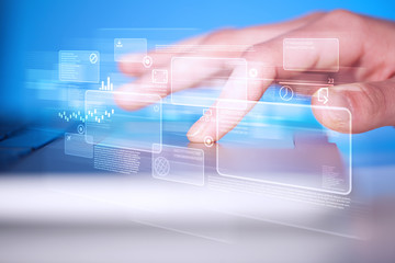 Hand touching keyboard with high tech buttons