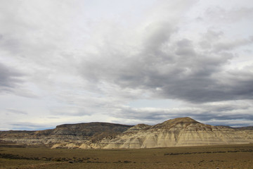 Fototapeta na wymiar Eroded mountain landscape along ruta 40, through the Patagonian desert in Patagonia, Argentina