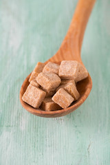 brown sugar on trquoise background