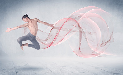 Obraz na płótnie Canvas Dancing ballet performance artist with abstract swirl
