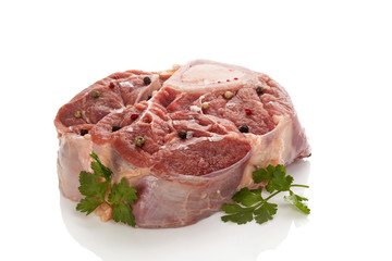 Raw ossobucco isolated on white background
