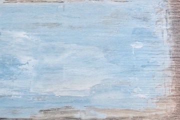 Blue textured wooden background.